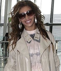 Photo of Beyonce Knowles Wearing Alexis Bittar Earrings at Heathrow Airport in London Photo of Beyonce Knowles Wearing Alexis Bittar Earrings at Heathrow Airport in London