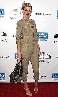 Model Angela Lindvall Wears a Khaki Jumpsuit to the Launch of Russell James's New Book
