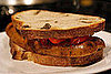 Recipe For Grilled Gourmet Sausage Sandwich With Peppers and Onions on Olive Bread