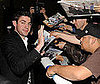 Photo of John Krasinski Signing Autographs Before an Event for The Office