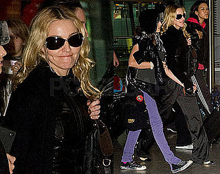 Photos of Madonna, Who's Written in a Malawian Newspaper of Her Desired Adoption of Mercy James, at Heathrow