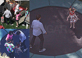 Suri Bounces Her Way Into Three With Her Family