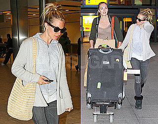 Photo of Sienna Miller at London's Heathrow Airport