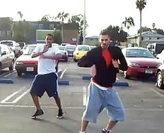 Two Guys Dance to Britney Spears's Circus in a Parking Lot Two Guys Dance to Britney Spears's Circus in a Parking Lot