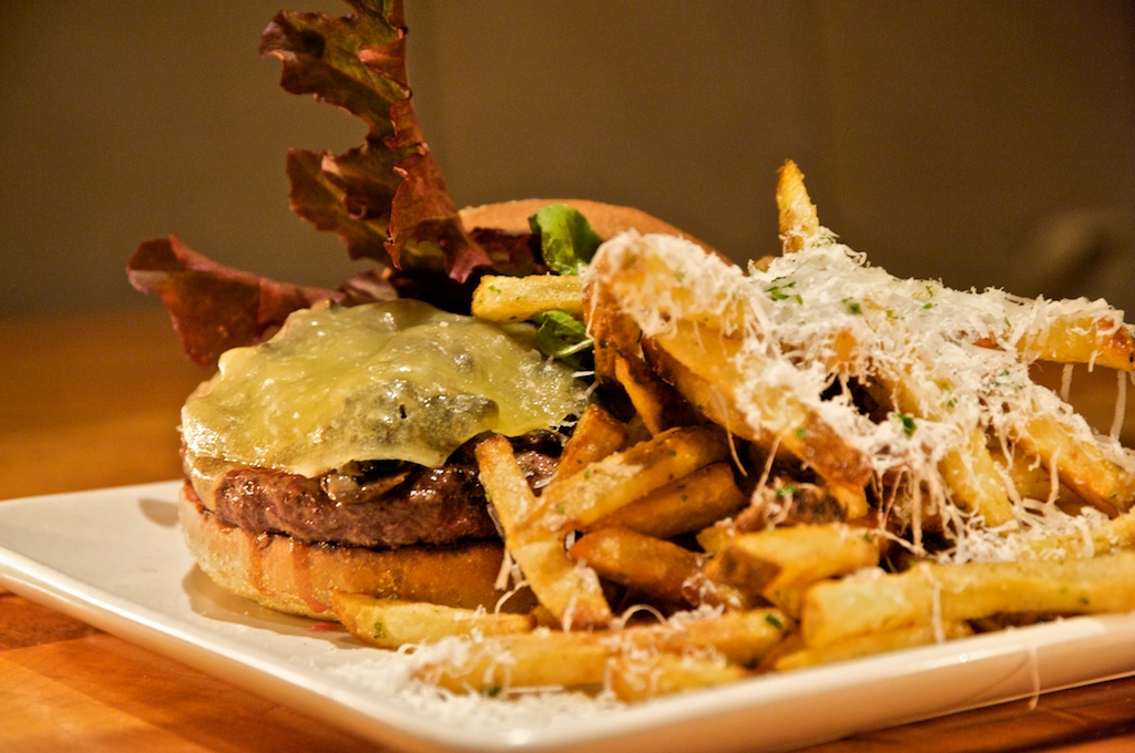 Prather ranch beach burger with aged gouda, caramelized onion, mushroom, kennebec fries Prather ranch beach burger with aged gouda, caramelized onion, mushroom, kennebec fries