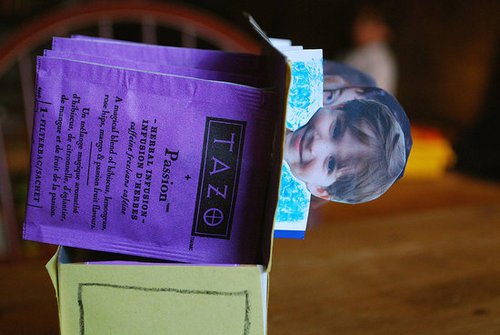 Attach tea bags to "people" Attach tea bags to "people"