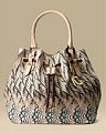 Roberto Cavalli Reptile Hybrid Bag: Love It or Hate It?
