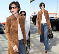 Katie Back At LAX, On Her Way To Sweet Suri?