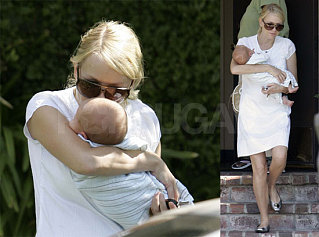 Naomi Can't Get Enough Of Her New Little One