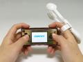 Strap-On Gadget Lets You Eat And Game 