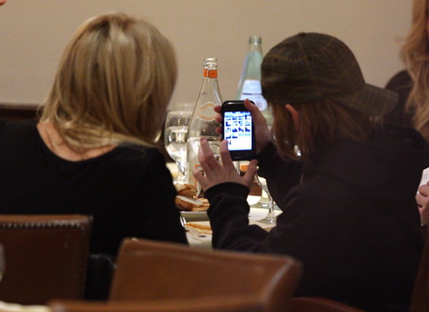 Guess Who Is Checking Out Her Brother's iPhone? 