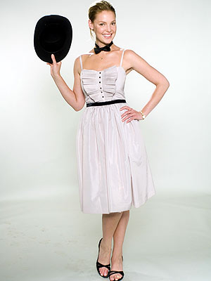 PUTTIN' ON THE RITZ
"Oh, I love that one!" says Thomas of this tuxedo-inspired dress that reminded her of a New Year's Eve cock
