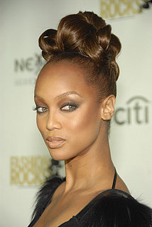 Love It or Hate It? Tyra's Fiercely Curled Updo